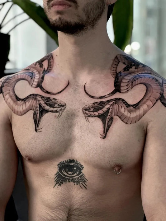 Big Neo Traditional Twin Cobras and Eye on Men Chest Tattoo by @francescailfungo_tattooer