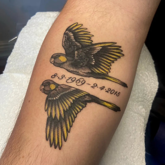 Big Neo Traditional Two Flying Birds with Memorial Dates on Women Arm Tattoo by @fioretattoos
