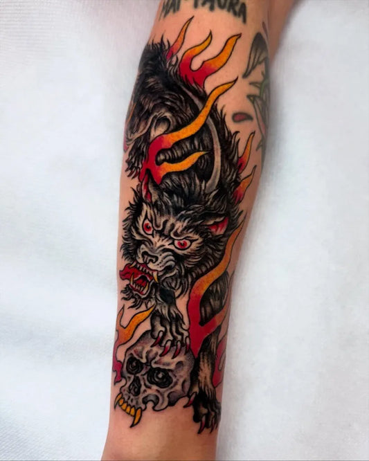 Big Neo Traditional Wolf with Flames and Skull on Men Arm Tattoo by @maddydebattisti