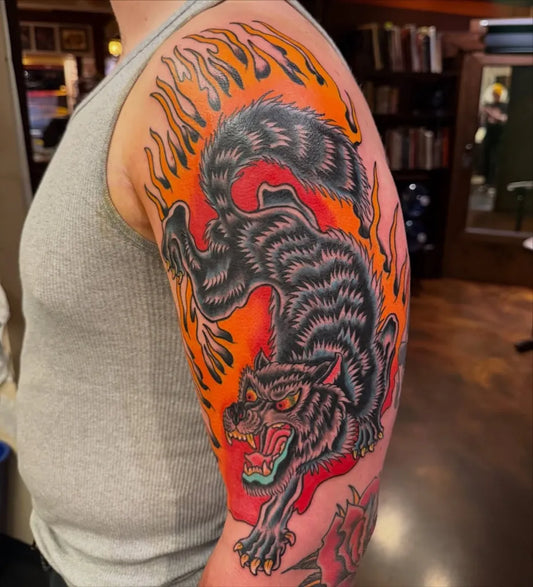 Big Neo Traditional Wolf with Flames on Men Arm Tattoo by @tberrytattoos