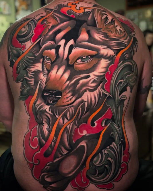 Big Neo Traditional Wolf with Flames on Men Back Tattoo by @corycartwright