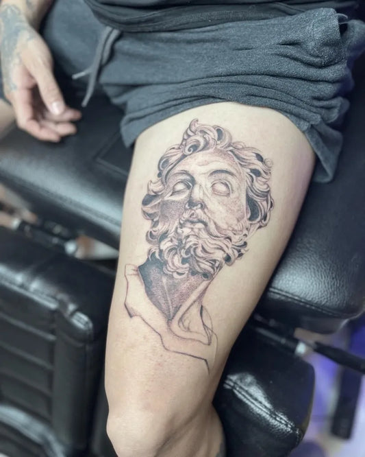 Big Neoclassical Portrait on Men Thigh Tattoo by @bondtattooer