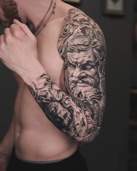 Big Neoclassical Zeus and Bearded Men on Men Arm Tattoo by @aarontorrestattoo