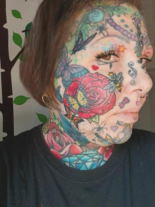 Big Neotraditional Butterfly Rose Bee on Women Face Tattoo by @colorfully.tattooed