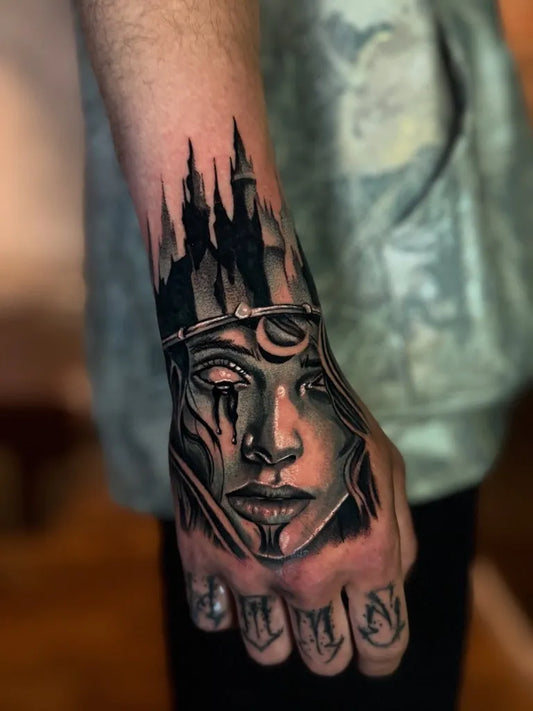 Big Neotraditional Castle Crown Face on Men Wrist Tattoo by @felleti_1nk