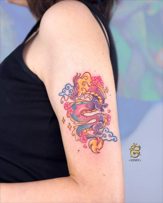 Big Neotraditional Dragon and Flowers on Women Arm Tattoo by @selenarte.tattoo