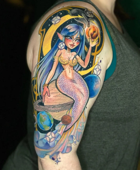 Big Neotraditional Mermaid with Crescent Moon and Planets Tattoo on Women Shoulder by @sarahfigueroatattoos