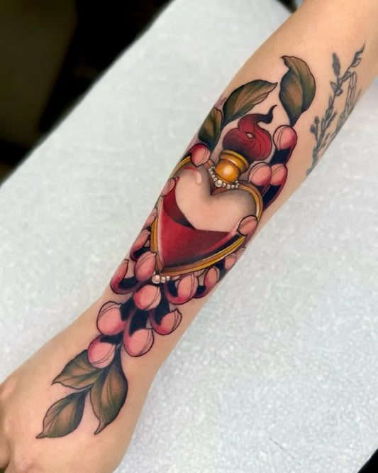 Big Neotraditional Perfume Bottle Heart Berries on Women Forearm Tattoo by @jasminecrossi