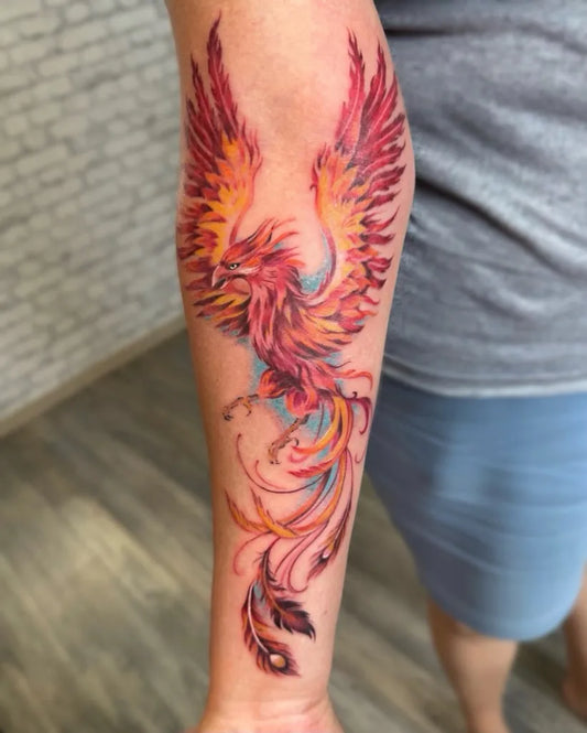 Big Neotraditional Phoenix on Women Arm Tattoo by @lyuba.tattoo