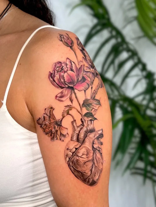 Big Neotraditional Rose Heart Bird Women Shoulder Rose Tattoo by @thalia.brush
