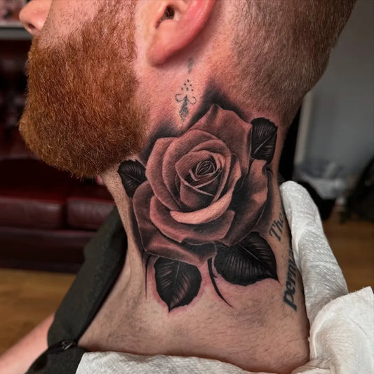 Big Neotraditional Rose on Men Neck Tattoo by @gregwhelantattoo