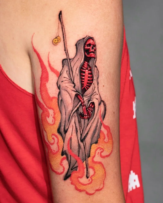 Big Neotraditional Skeletal Reaper with Staff and Flames on Women Arm Tattoo by @tattoosfolder