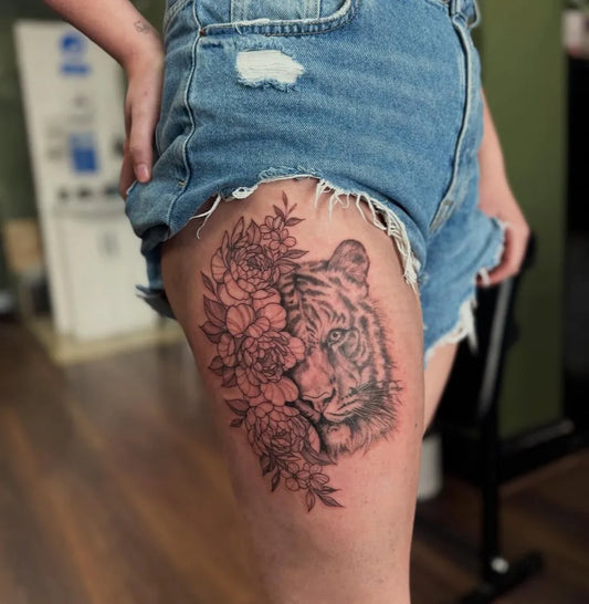 Big Neotraditional Tiger and Flowers on Women Thigh Tattoo by @emburdentattoo