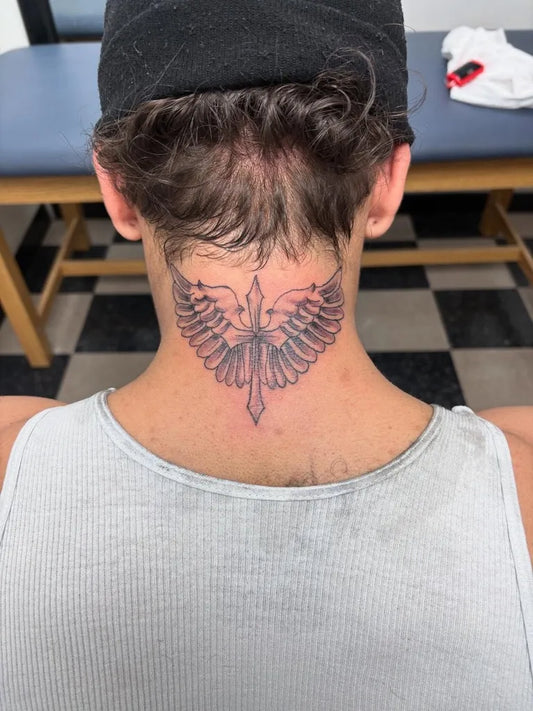 Big Neotraditional Winged Dagger on Men Neck Tattoo by @eve.elizabeth_
