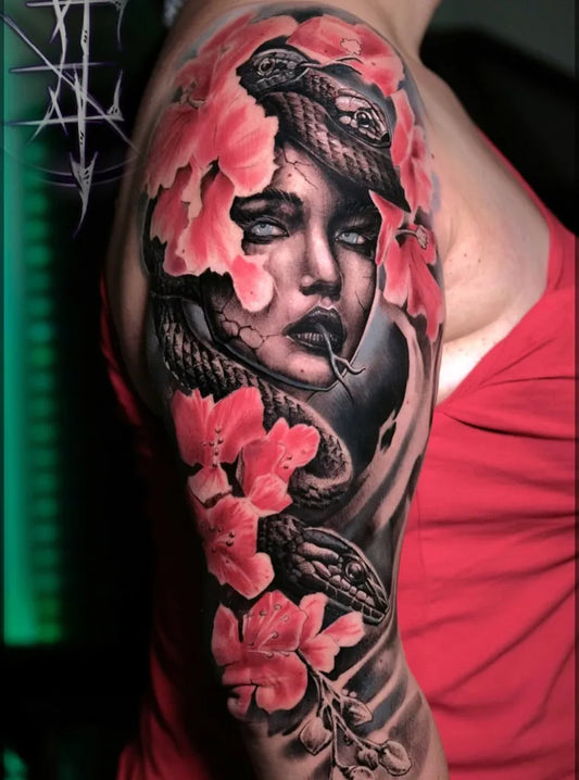Big Neotraditional Woman with Snake and Flowers on Women Arm Tattoo by @featherworks_tattoos