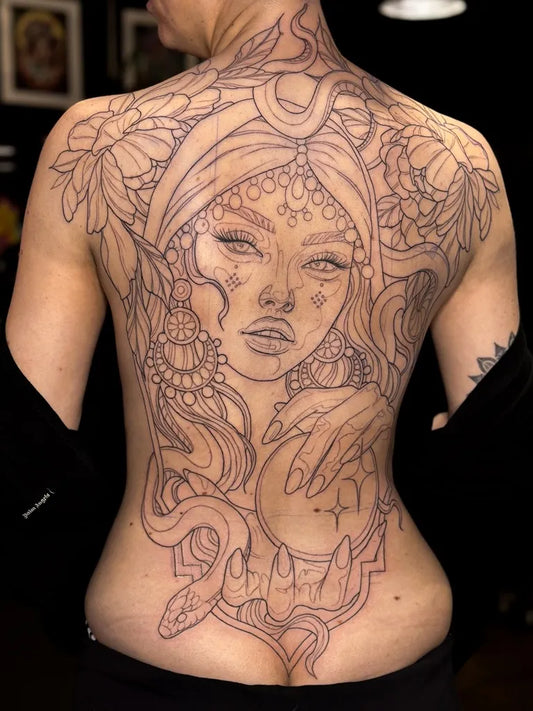 Big Neotraditional Woman with Snake and Flowers on Women Back Tattoo by @lauragascoynee_tattoo