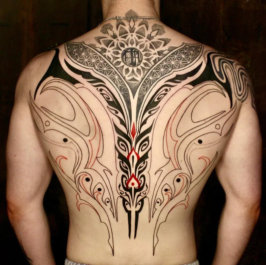 Big Neotribal Symmetrical Mandala and Stylized Creatures on Men Back Tattoo by @kriyaluna