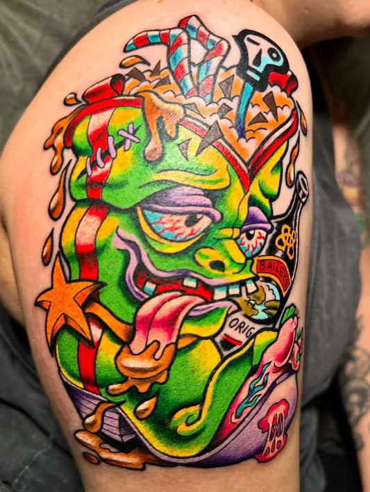 Big New School Green Monster with Candy Tattoo on Men Arm by @the_egyptian_magician