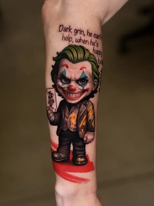 Big New School Joker with Playing Card on Men Arm Tattoo by @jeka_s_tattoo