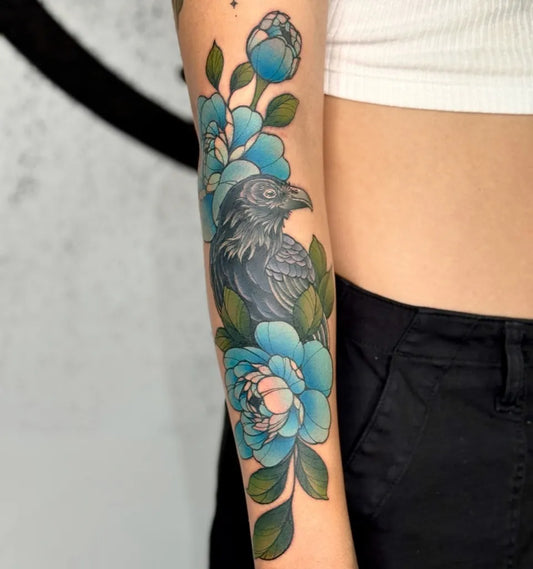 Big New School Raven and Peonies on Women Arm Tattoo by @abiloveless