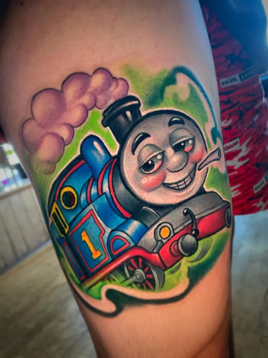 Big New School Thomas the Train Tattoo on Men Thigh by @joshhermantattoo