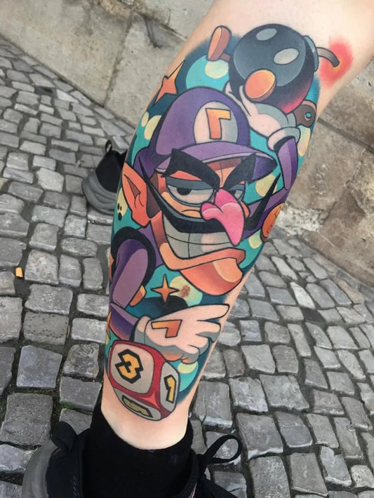 Big New School Wario with Bombs and Dice Tattoo on Men Leg by @lehelperspektiv