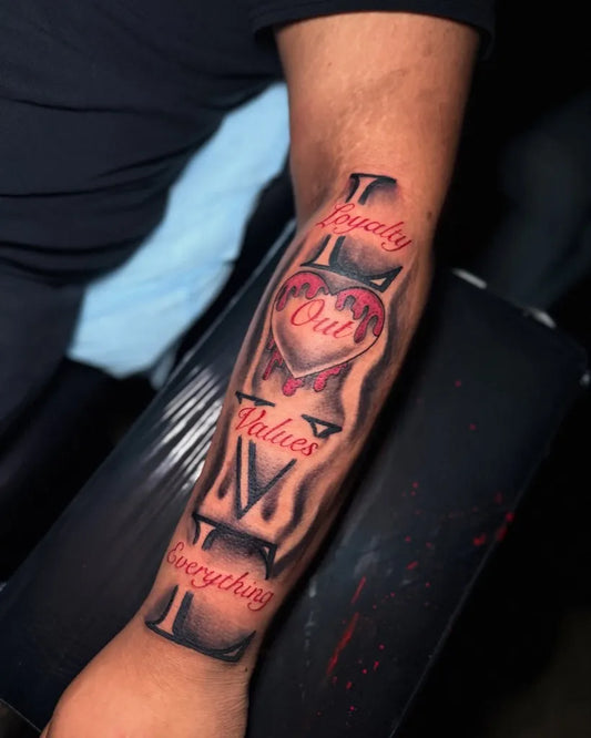 Big Old English lettering heart on Men Forearm Tattoo by @tatted.v
