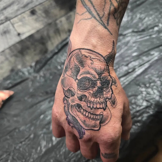 Big Onibi Skull on Men Hand Tattoo by @on_tatted_wings