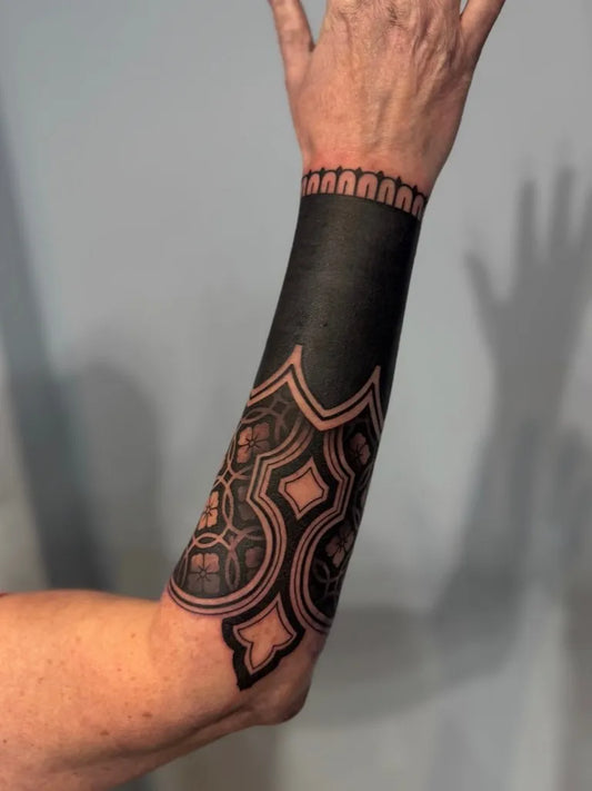 Big Ornamental Geometric Blackwork Tattoo on Men Forearm by @rebecca_zombie_tattoo