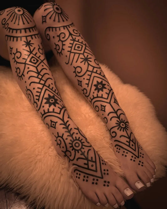 Big Ornamental Geometric Patterns Tattoo on Women Leg by @mastika.tattoo