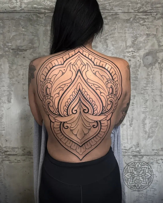 Big Ornamental Mandala Tattoo on Women Back by @tattoosby.newyork