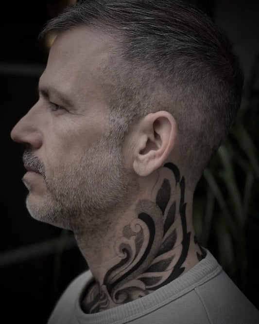 Big Ornamental Swirls and Leaves on Men Neck Tattoo by @satips_tattoo