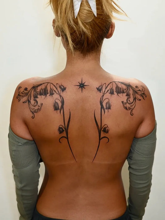 Big Ornate Floral Wings on Women Back Tattoo by @softchicktattoo