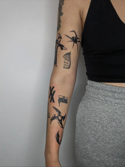 Big Patchwork Crosses and Wings on Women Arm Tattoo by @maycees_art