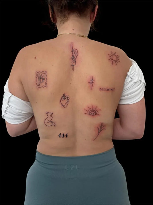 Big Patchwork Heart Cross Sun on Women Back Tattoo by @ehose_tattoo