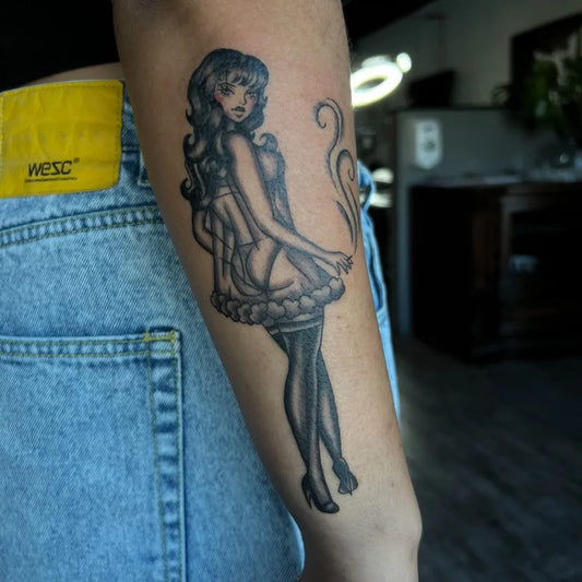Big Pinup Black and Grey Pin Up Girl Smoking Tattoo on Women Arm by @ttheresa.tado0