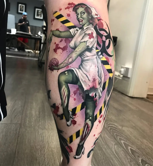 Big Pinup Zombie Nurse Pin Up Girl Holding Brain Tattoo on Women Leg by @bethanyriverstattoos