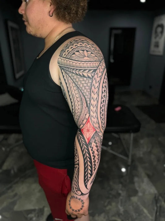 Big Polynesian Arm Sleeve Tattoo on Women Arm by @tikinuts