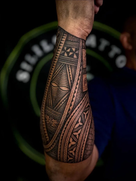 Big Polynesian Tribal Armband Tattoo on Men Arm by @sililo.tattoo