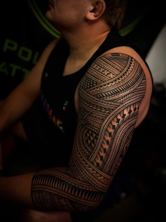 Big Polynesian Tribal Patterns Tattoo on Men Arm by @sililo.tattoo