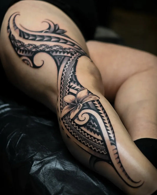 Big Polynesian Tribal Patterns and Flower Tattoo on Women Thigh by @kurtistattoos