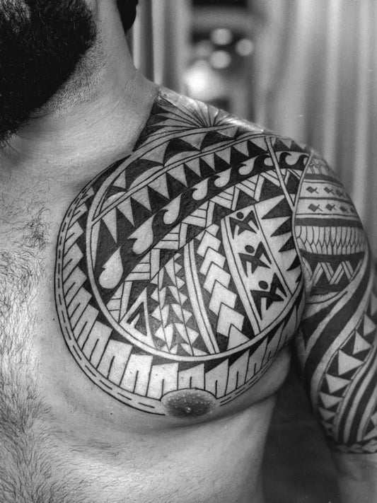 Big Polynesian Tribal Patterns on Men Chest Tattoo by @vi_tattoo_studio_delhi