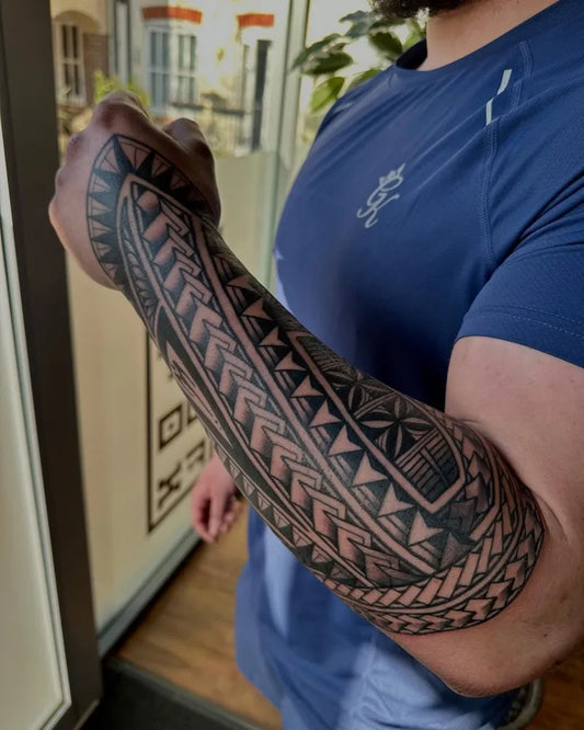 Big Polynesian Tribal Sleeve Tattoo on Men Arm by @_tattoofx
