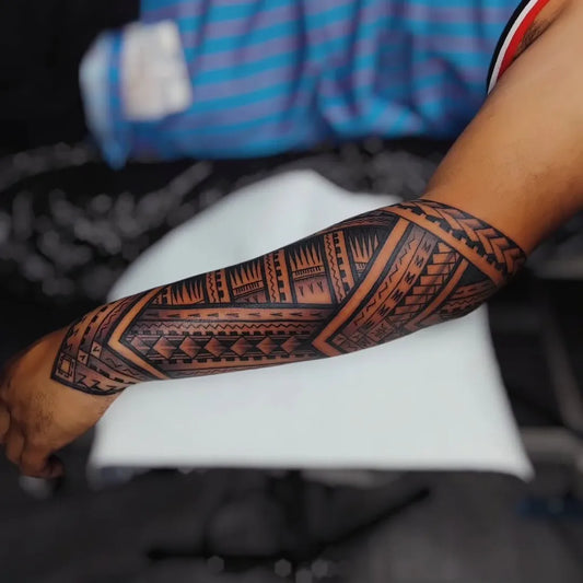 Big Polynesian Tribal Sleeve Tattoo on Men Arm by @nukualofatattoo
