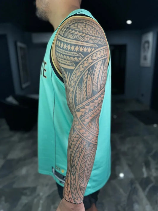 Big Polynesian Tribal Sleeve Tattoo on Men Arm by @tikinuts