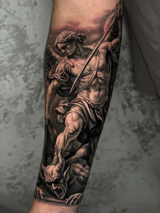 Big Realism Archangel Michael Slaying Demon Tattoo on Men Arm by @ceretotattoo