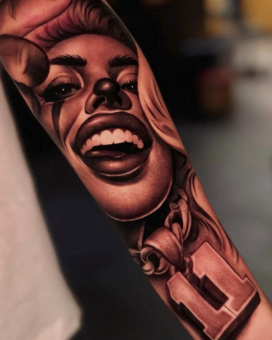 Big Realism Clown Face with Number 11 Tattoo on Women Arm by @aliano_michele