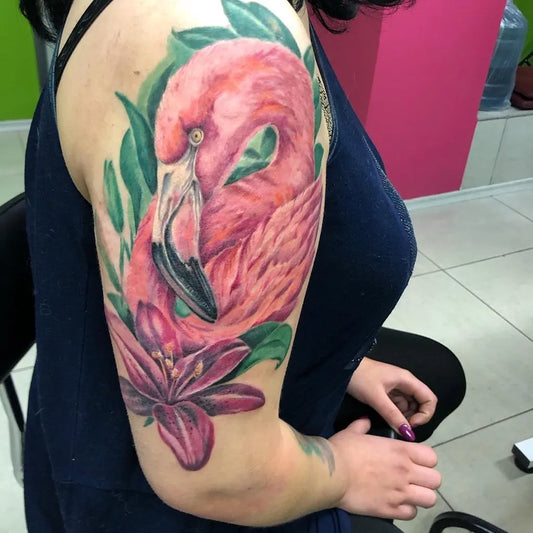 Big Realism Flamingo and Lily Tattoo on Women Shoulder by @rissine_art_tattoo