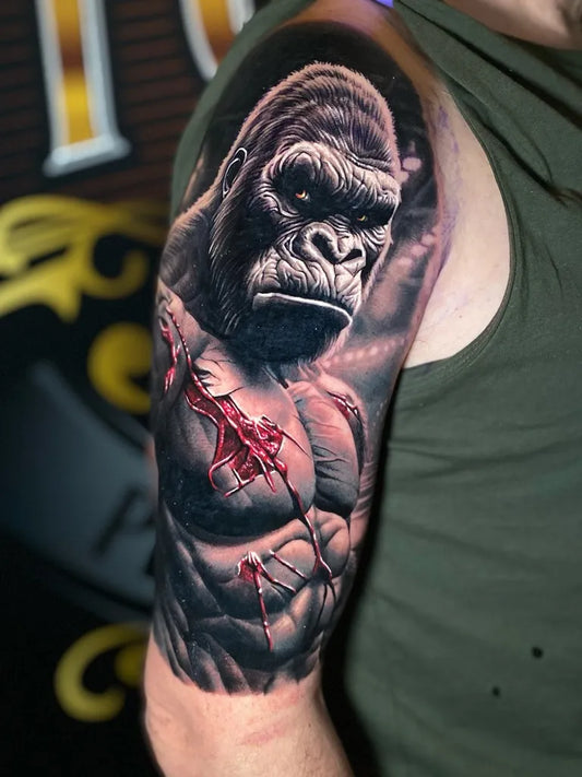 Big Realism Gorilla with Muscles Tattoo on Men Arm by @tattooclubmaasbracht