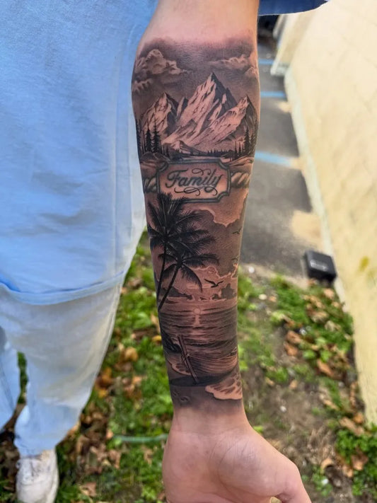 Big Realism Mountain Landscape with Palm Tree and Family Text Tattoo on Men Arm by @ervtattoos